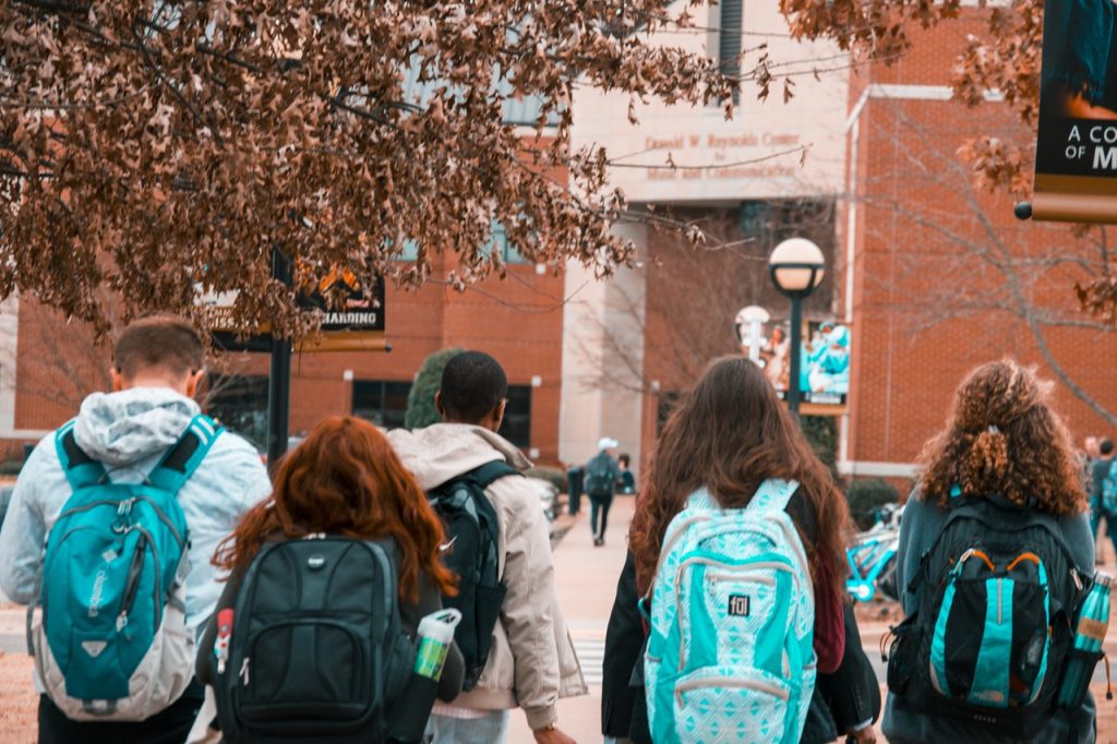 group of high school students wearing backpacks who will need student resume