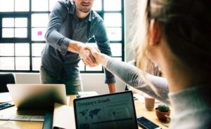 prospective employer expects an applicant to shake hands during interview.