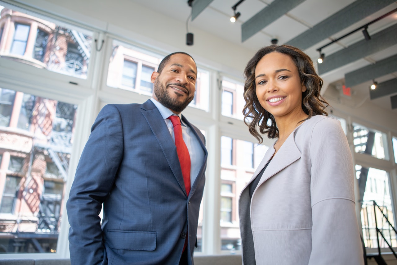 two applicants wearing proper job interview outfits