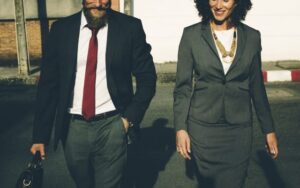 Man and Woman Walking on their Way to Work