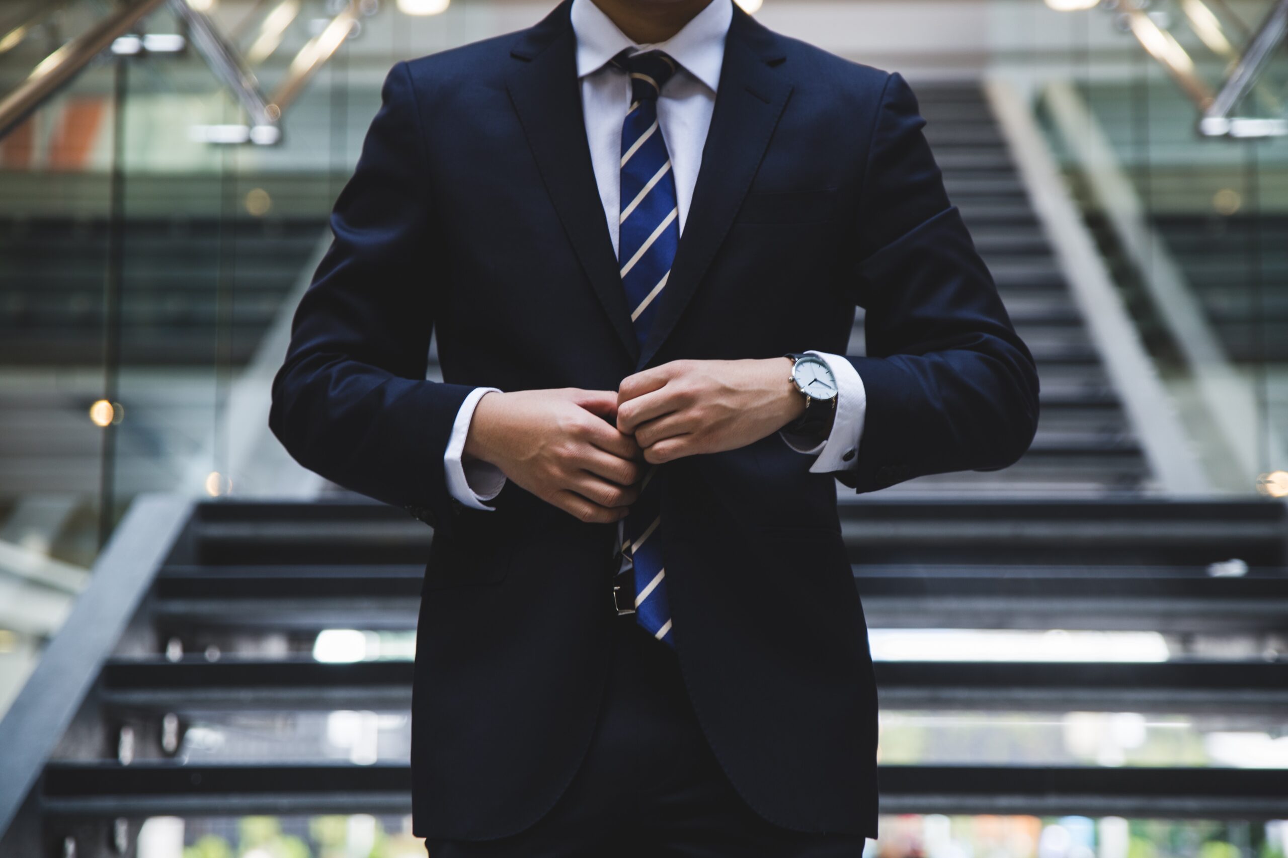 a man wearing nice suits for his executive job interview