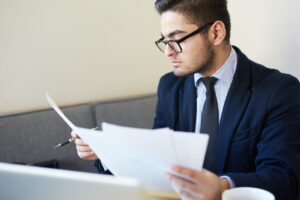 a recruiter reading a resume prepared by an online resume writing firm
