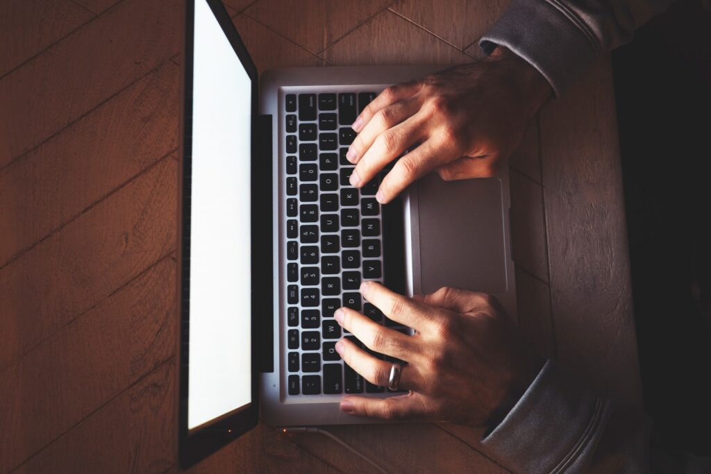 job seeker using laptop to browse online