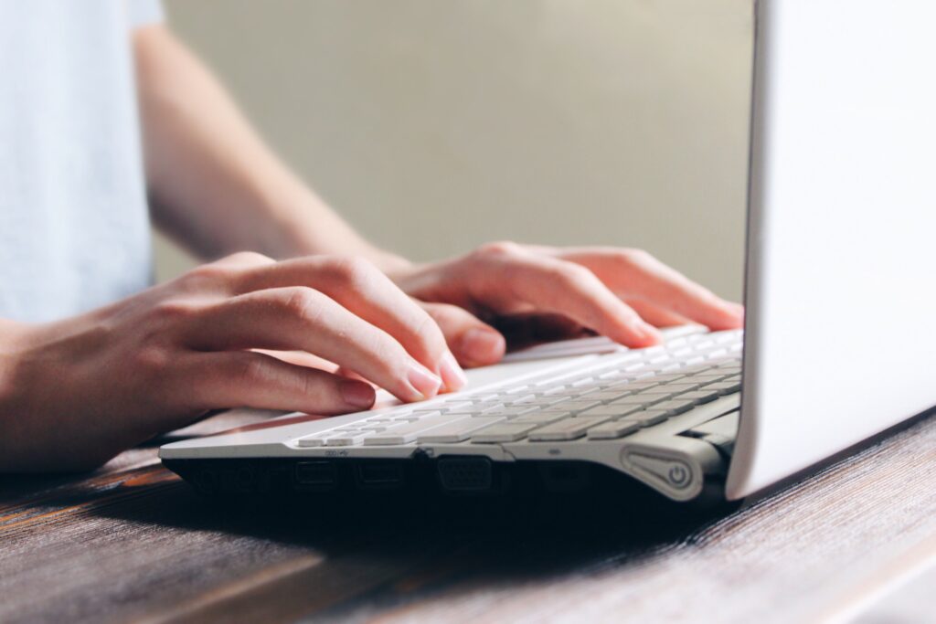 job seeker using laptop to search for jobs