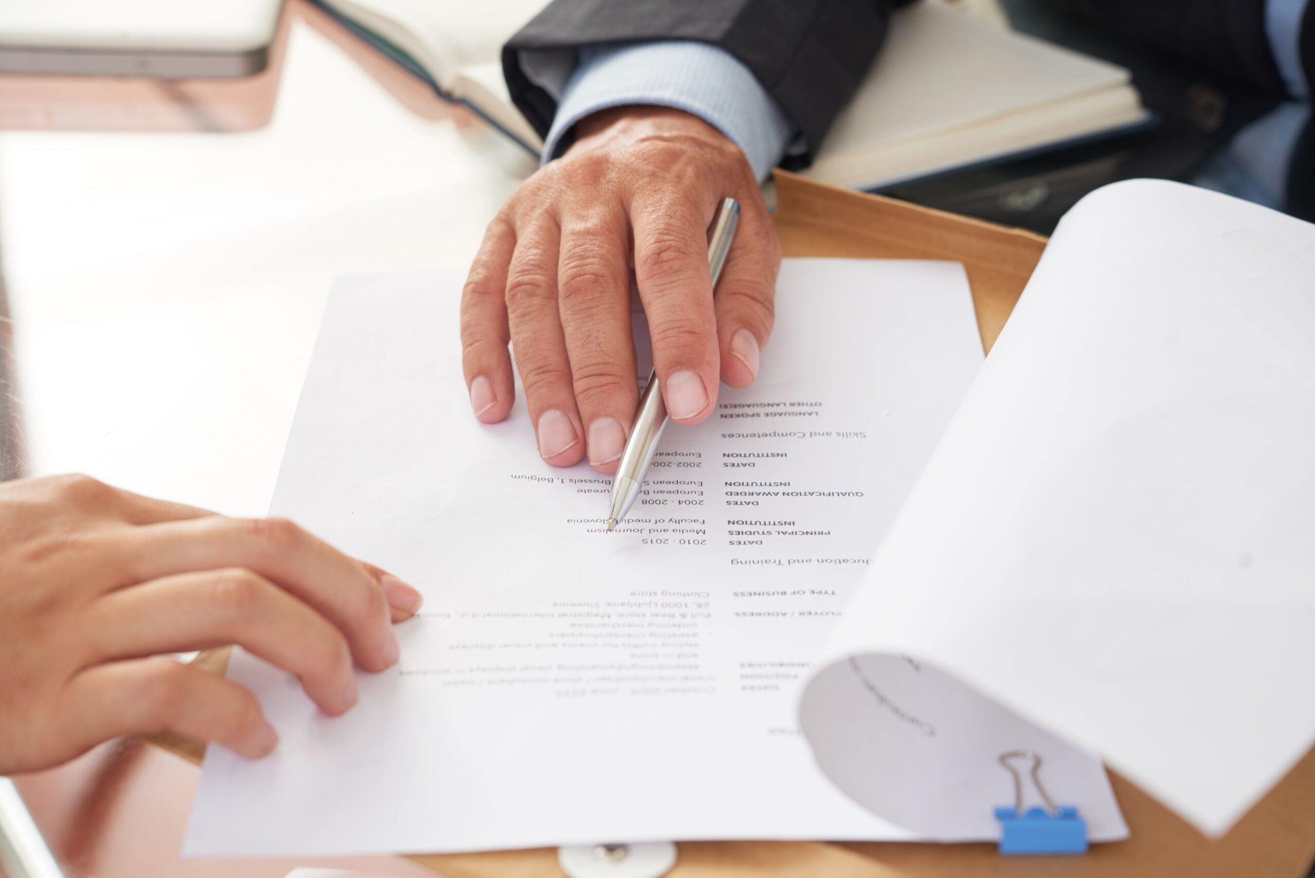 Candidate explaining resume gap at the table during a job interview